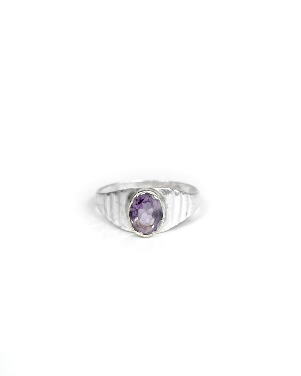 Ring with Oval Stone in Ribbed Setting